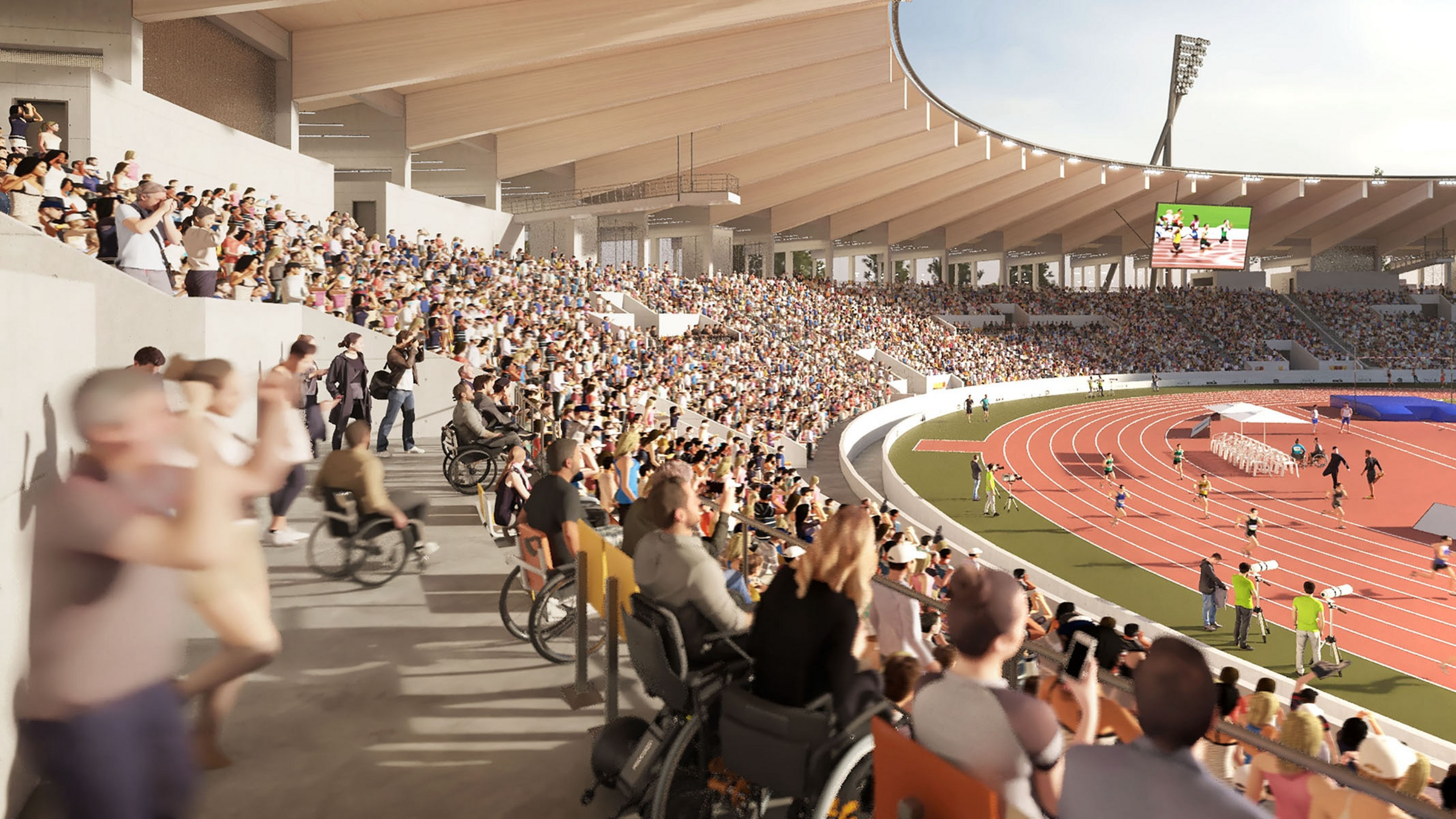 Das Planungsbild zeigt, wie der Innenraum des neuen Stadions des Freidrich-Ludwig-Jahn-Sportparks in Zukunft aussehen soll. Im Vordergrund sind Rollstuhlfaher zu sehen.
